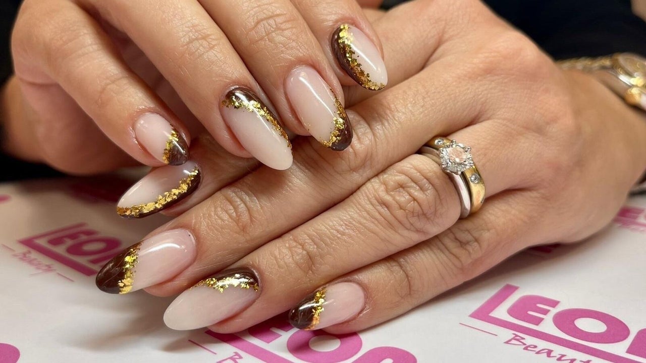 Nude almond nails with gold leaf nail art