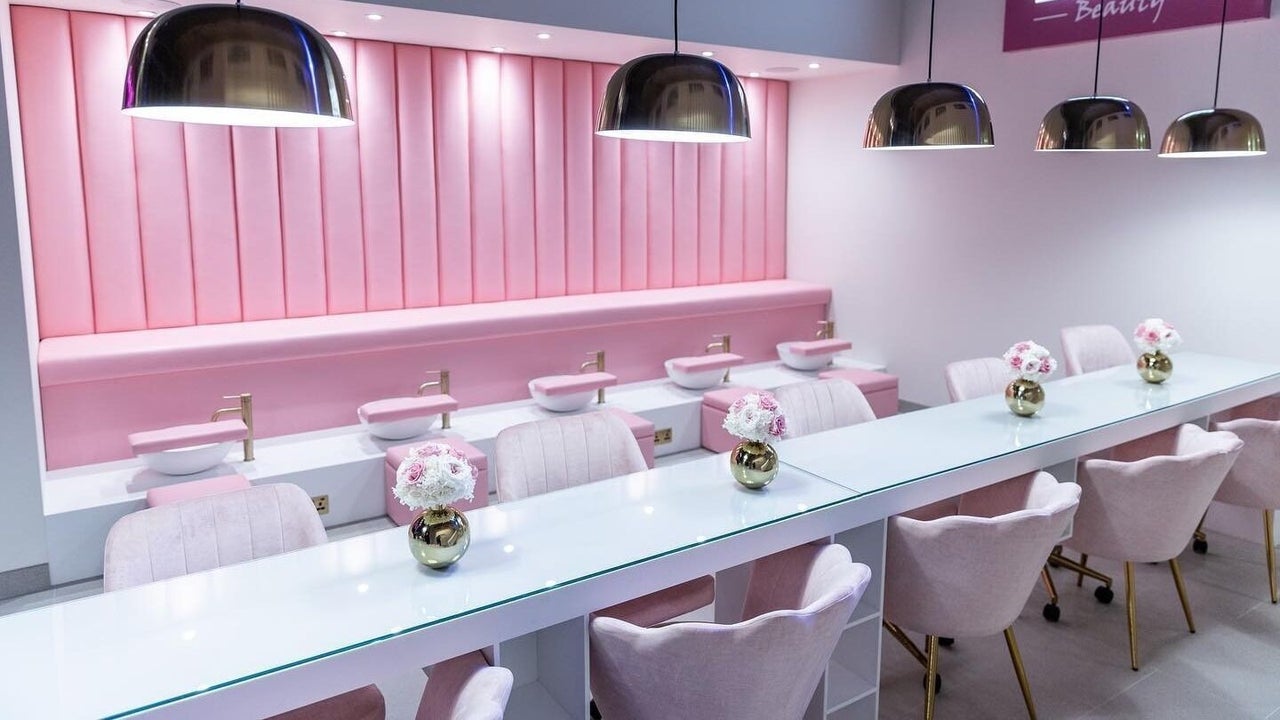 Pink nail bar with velvet chairs inside Leon Beauty